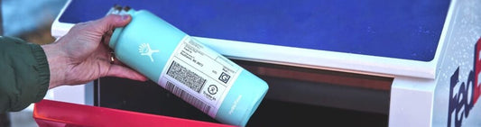 hydro flask being put into a fedex box