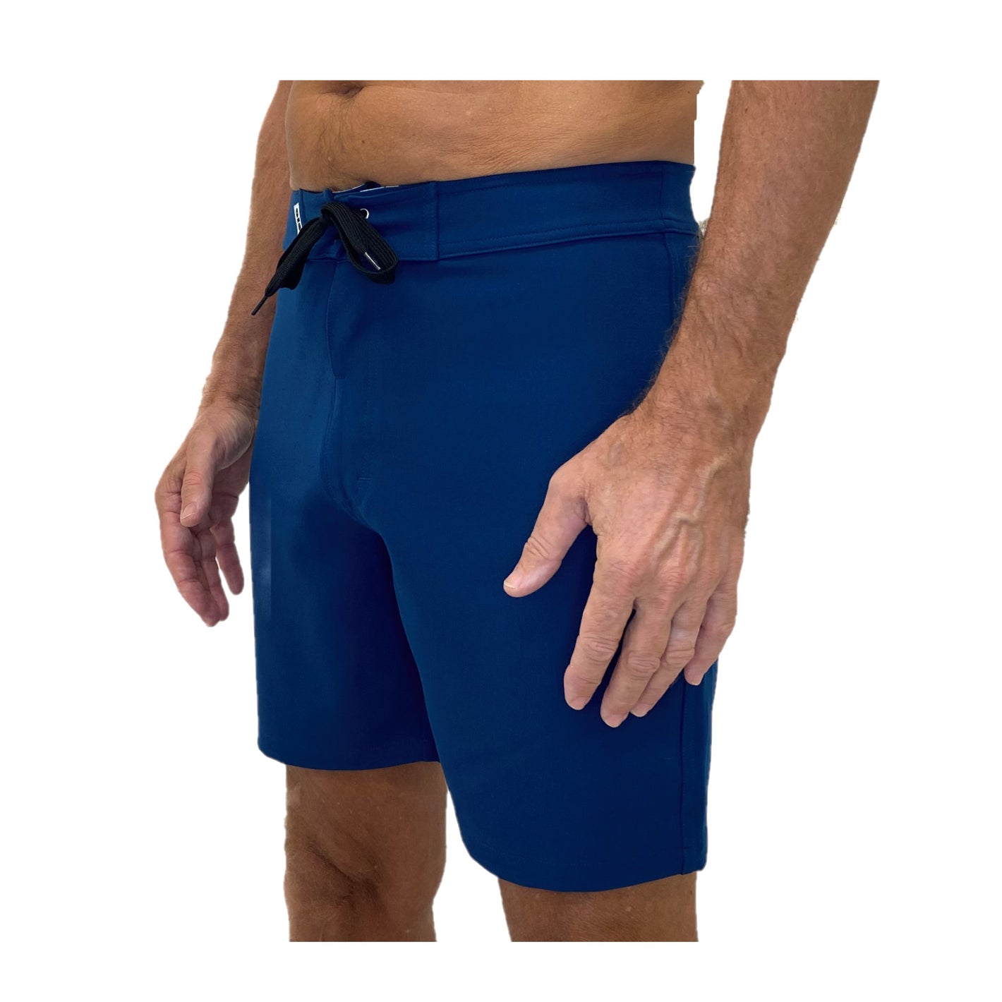 three quarter angle photo of the torso of a man wearing a boardshort